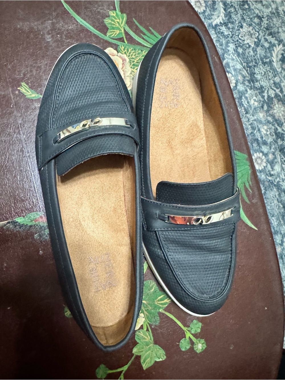 Naturalized Black Slip-On Loafers with Metal Accent
